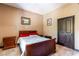 Simple bedroom with hardwood floors and a wood bed frame at 362 Rainbow Canyon Blvd, Las Vegas, NV 89124
