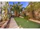 Private putting green in backyard for golf enthusiasts at 3940 Spencer St, Las Vegas, NV 89119