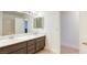 Clean bathroom with double vanity and tile floors at 4420 Resthaven Cir, North Las Vegas, NV 89032