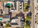 Aerial view of a property with two houses, pools, and solar panels on the roof at 5110 N Valadez St, Las Vegas, NV 89149