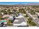 Aerial view of house, pool, and neighborhood at 5110 N Valadez St, Las Vegas, NV 89149