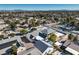 Wide aerial showcasing house, pool, and neighborhood at 5110 N Valadez St, Las Vegas, NV 89149