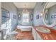 Elegant bathroom featuring a clawfoot tub and updated vanity at 5110 N Valadez St, Las Vegas, NV 89149