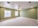 Spacious basement bedroom with carpet and ceiling fan at 5110 N Valadez St, Las Vegas, NV 89149