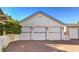 Three-car detached garage with white exterior at 5110 N Valadez St, Las Vegas, NV 89149