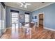 Spacious home office with hardwood floors and built-in shelving at 5110 N Valadez St, Las Vegas, NV 89149