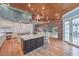 Bright kitchen with large island and custom cabinetry at 5110 N Valadez St, Las Vegas, NV 89149