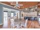 Open concept kitchen and breakfast nook with island and hardwood floors at 5110 N Valadez St, Las Vegas, NV 89149