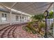 Brick patio with pond, fountain, and pergola at 5110 N Valadez St, Las Vegas, NV 89149