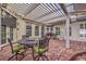 Covered patio with seating area and brick flooring at 5110 N Valadez St, Las Vegas, NV 89149