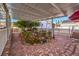 Relaxing patio with brick flooring, water feature, and pergola at 5110 N Valadez St, Las Vegas, NV 89149