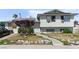 Charming two-story home with solar panels, a small tree, and a simple landscaped front yard at 6324 Fairwood Ave, Las Vegas, NV 89107