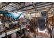 Messy shed with exposed beams, tools, and building materials at 6324 Fairwood Ave, Las Vegas, NV 89107