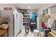 This is a crowded storage space with shelving and various household items at 6324 Fairwood Ave, Las Vegas, NV 89107