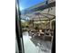 Covered patio features comfortable seating and string lights at 6329 Kitamaya St, North Las Vegas, NV 89031