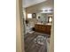 Spa-like bathroom featuring a soaking tub and double sink vanity at 6329 Kitamaya St, North Las Vegas, NV 89031