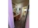 Bathroom with double vanity and wood-look flooring at 6329 Kitamaya St, North Las Vegas, NV 89031