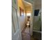 Small bathroom with toilet, shower, and wood-look flooring at 6329 Kitamaya St, North Las Vegas, NV 89031