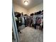 Large walk-in closet with ample shelving and hanging space at 6329 Kitamaya St, North Las Vegas, NV 89031