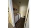 Convenient laundry room with washer, dryer, and shelving at 6329 Kitamaya St, North Las Vegas, NV 89031