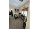 Cozy sitting area with comfortable chair and decorative accents at 6329 Kitamaya St, North Las Vegas, NV 89031