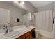 Bathroom with double vanity and shower/tub combo at 708 Bridgeford Ct, Henderson, NV 89011