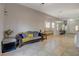 Spacious living room with tile flooring and lots of natural light at 708 Bridgeford Ct, Henderson, NV 89011