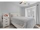 Spacious bedroom with a queen bed and access to a private balcony at 779 Omaggio Pl, Henderson, NV 89011