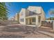 Home features a covered patio and a gravel backyard at 7808 License St, Las Vegas, NV 89131
