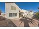 Spacious backyard with gravel and a view of the home's exterior at 7808 License St, Las Vegas, NV 89131