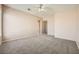 Spacious bedroom with carpet flooring and access to bathroom at 7808 License St, Las Vegas, NV 89131