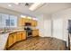 Kitchen with light wood cabinets, granite countertops, and stainless steel appliances at 7808 License St, Las Vegas, NV 89131