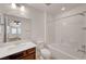 Bathroom features a single vanity and tub at 824 Bluebird Hill Ave, North Las Vegas, NV 89084