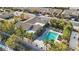 Aerial view showing single-story home, pool, spa, and surrounding landscape at 8716 Purple Wisteria St, Las Vegas, NV 89131