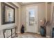 Elegant entryway with glass door and decorative accents at 8716 Purple Wisteria St, Las Vegas, NV 89131