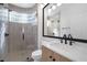 Contemporary bathroom with a glass enclosed shower and floating vanity at 8924 Rainbow Ridge Dr, Las Vegas, NV 89117