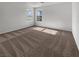 Bright bedroom with carpeted floor and large windows at 10375 Beallsville St, Las Vegas, NV 89141