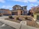 Two-story house with attached garage and desert landscaping at 10375 Beallsville St, Las Vegas, NV 89141