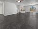 Open living area with dark gray tile flooring at 10375 Beallsville St, Las Vegas, NV 89141