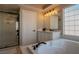 Elegant bathroom with soaking tub, double sinks, and a large shower at 10744 Balsam Creek Ave, Las Vegas, NV 89144