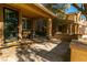 Covered front porch with seating area and a view of the neighborhood at 10744 Balsam Creek Ave, Las Vegas, NV 89144