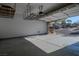 Spacious garage with epoxy floor and overhead storage at 10744 Balsam Creek Ave, Las Vegas, NV 89144