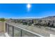 Private balcony overlooking community and mountains at 11377 Gravitation Dr, Las Vegas, NV 89135