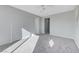 Bright bedroom featuring gray carpeting and ceiling fan at 11377 Gravitation Dr, Las Vegas, NV 89135