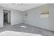 Large bedroom with access to hallway and natural light at 11377 Gravitation Dr, Las Vegas, NV 89135