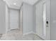 Bright entryway with white doors and marble tile floors at 11377 Gravitation Dr # 0, Las Vegas, NV 89135