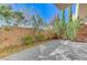 Private backyard patio with brick pavers and landscaping at 11377 Gravitation Dr # 0, Las Vegas, NV 89135