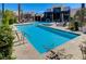 Inviting pool area with a spa and plenty of lounge chairs at 11377 Gravitation Dr # 0, Las Vegas, NV 89135