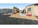 Backyard with trampoline, play equipment, and storage shed at 1215 Ferguson Ave, North Las Vegas, NV 89030