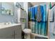 Clean bathroom with shower/tub combo and vanity at 1215 Ferguson Ave, North Las Vegas, NV 89030